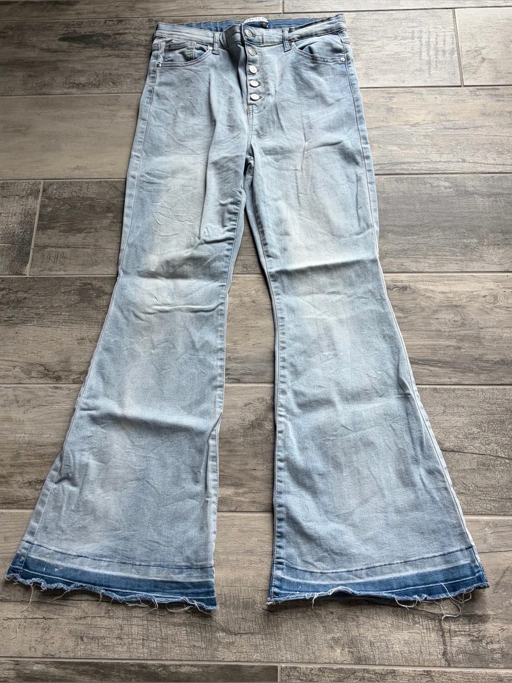 Light Wash Flare Jeans with Raw Hem